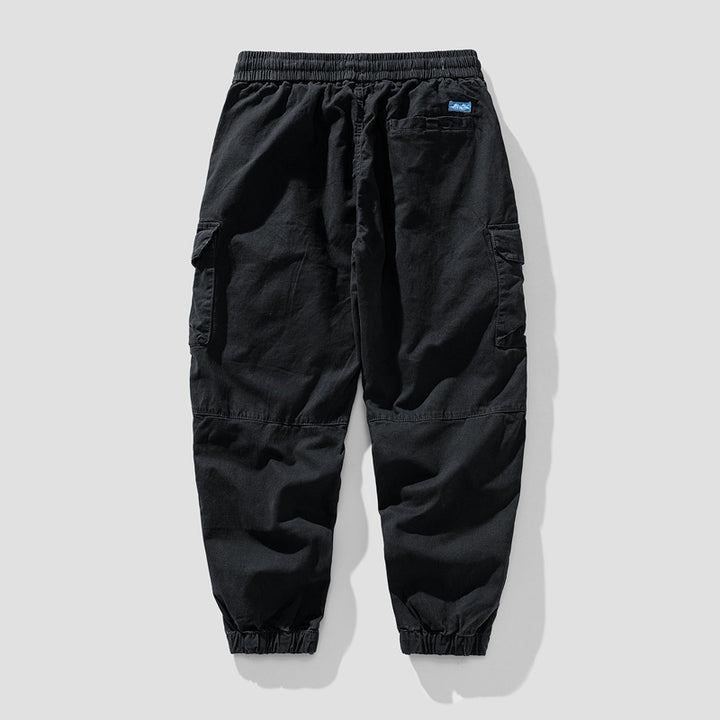 Herren Leichte Canvas-Cargohose im Joggerstil mit elastischem Bund, segmentierten Kniepaneelen und verdeckten Klappentaschen Drune