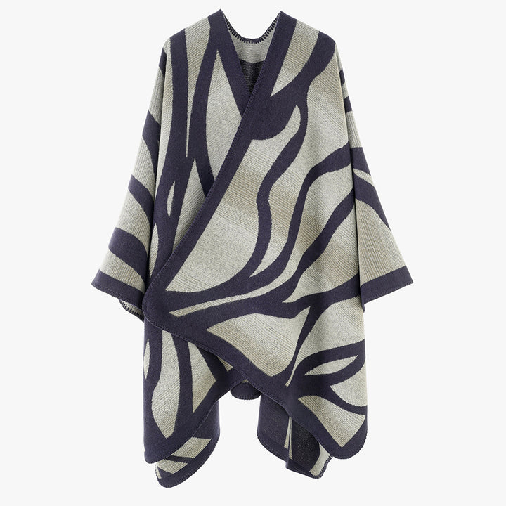 Damen Oversize-Strickcape mit abstrakter Wellenjacquard‑Struktur und kontrastierter Kettelkante Drune