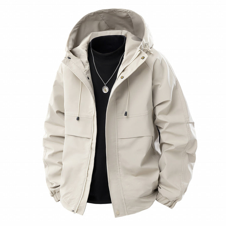 Herren Minimalistischer Tech-Softshell-Parka mit Kapuze, verdecktem Reißverschluss und Cargo-Brusttaschen Drune