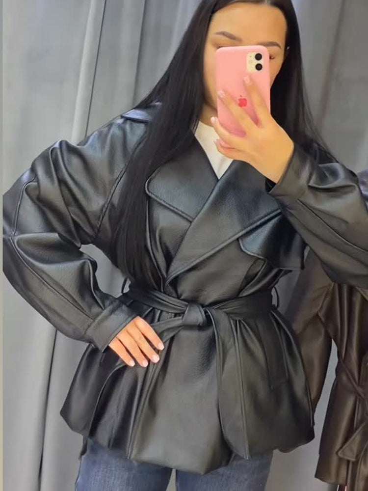 Damen Kurze Kunstleder-Wickeljacke mit Taillengürtel und übergroßem Revers Drune