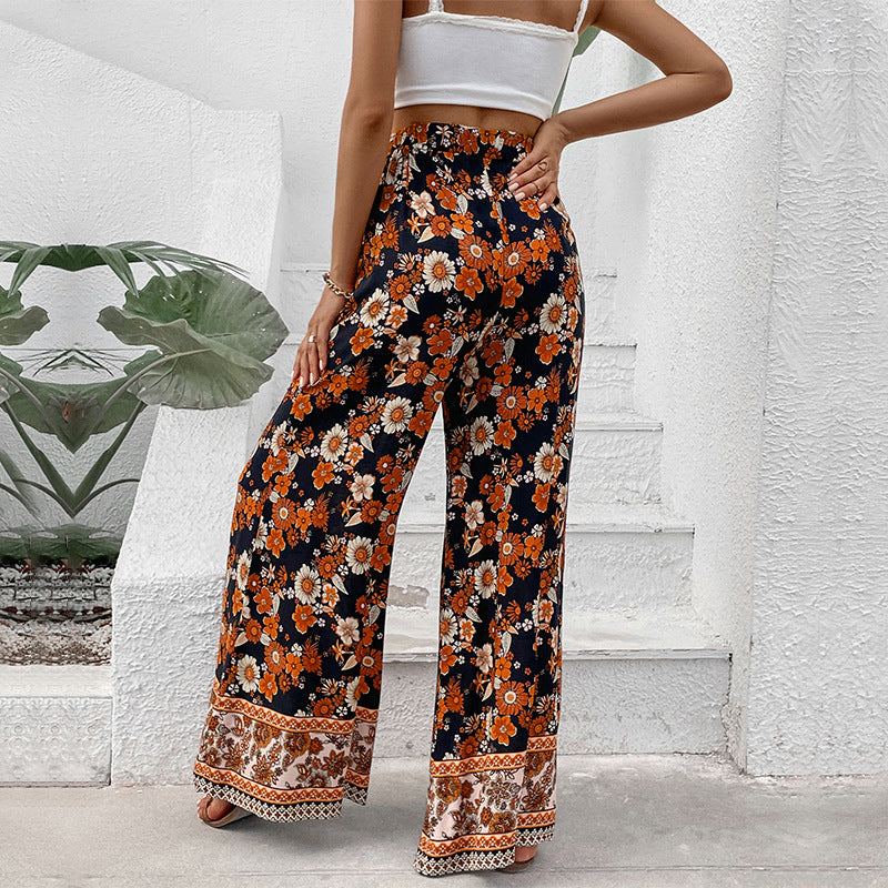 Damen Hochtaillierte weite Palazzohose mit floralem Alloverprint und Eingrifftaschen Drune