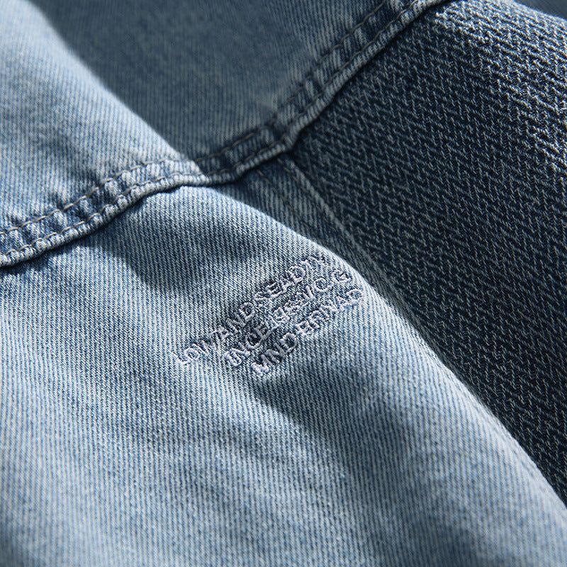Unisex Oversize-Jeansjacke mit kontrastreichen Webpaneelen und Druckknopfverschluss Drune