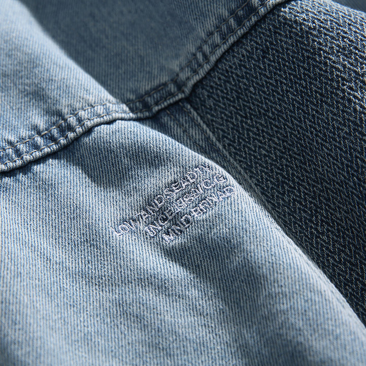 Unisex Oversize-Jeansjacke mit kontrastreichen Webpaneelen und Druckknopfverschluss Drune
