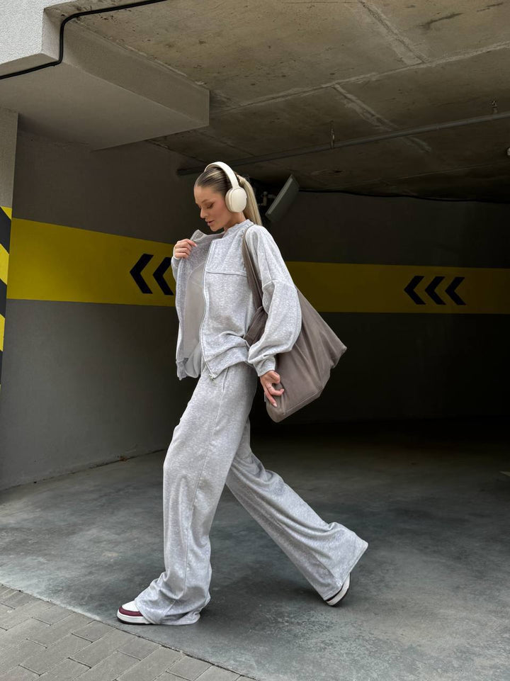Damen sportive Oversize-Fleecejacke mit diagonaler Reißverschluss-Optik und weit geschnittener High-Waist-Jogginghose Drune