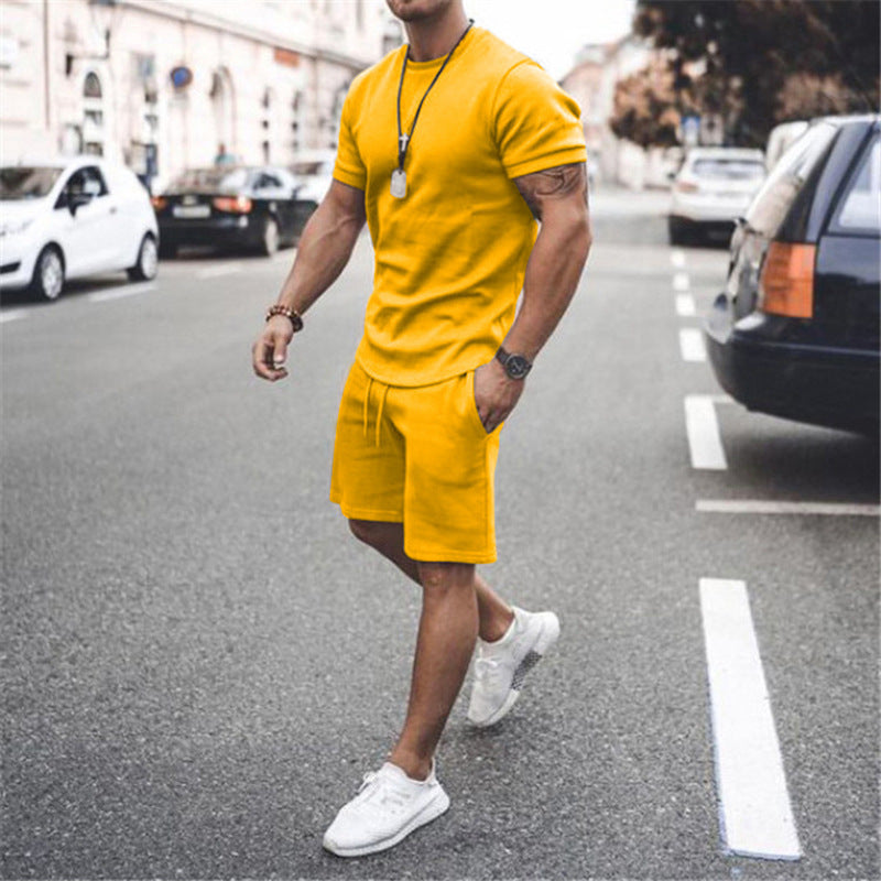 Herren nan figurbetontes Kurzarmshirt mit verstärkter Schulternaht und elastischer Kordelzug-Bermuda aus Stretchjersey Drune