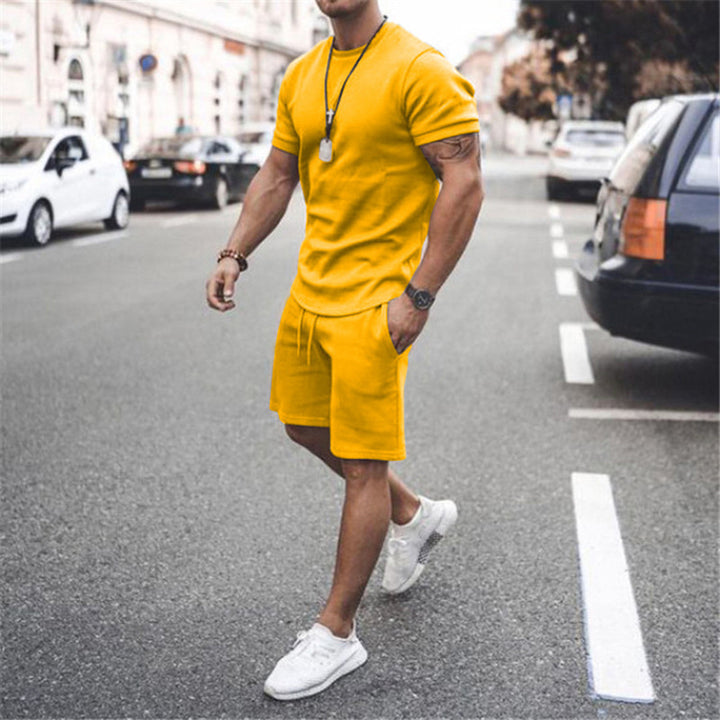 Herren nan figurbetontes Kurzarmshirt mit verstärkter Schulternaht und elastischer Kordelzug-Bermuda aus Stretchjersey Drune