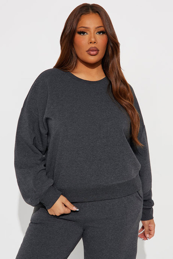 Damen cropped Sweatshirt mit überschnittenen Schultern und breitem Saum Drune