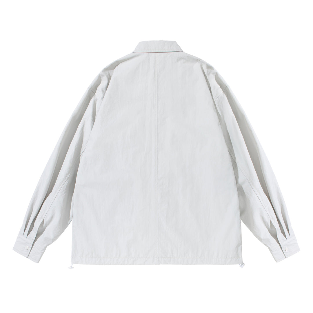 Unisex Oversize-Hemdjacke mit Druckknopfleiste und Pattentaschen Drune