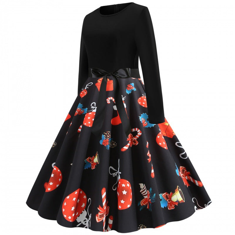 Damen Retro Swingkleid mit Jersey‑Oberteil, taillierter Satin‑Schärpe und festlichem Print Drune