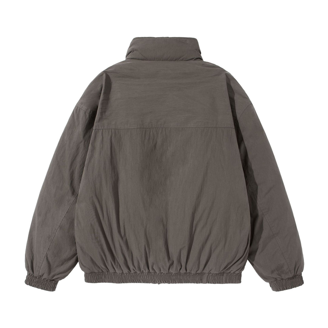 Unisex Kurz geschnittene gesteppte Boxy‑Blousonjacke mit hohem Stehkragen und Utility‑Flaptaschen Drune