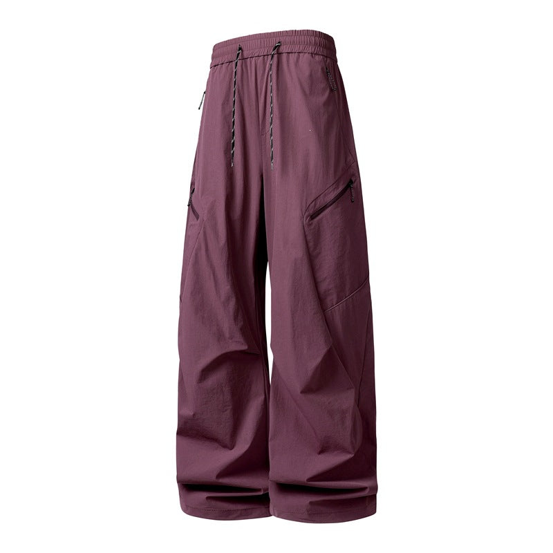 Herren Oversize-Utility-Cargo-Hose aus leichtem Nylon mit elastischem Kordbund, seitlichen Reißverschlusstaschen & weiter Ballon-Silhouette Drune