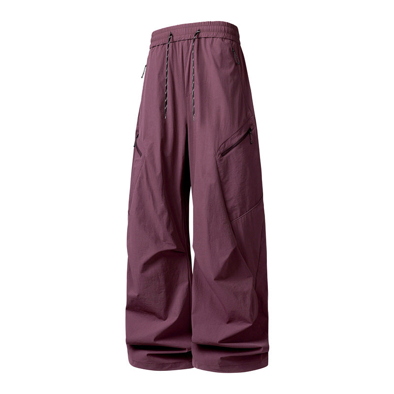 Herren Oversize-Utility-Cargo-Hose aus leichtem Nylon mit elastischem Kordbund, seitlichen Reißverschlusstaschen & weiter Ballon-Silhouette Drune