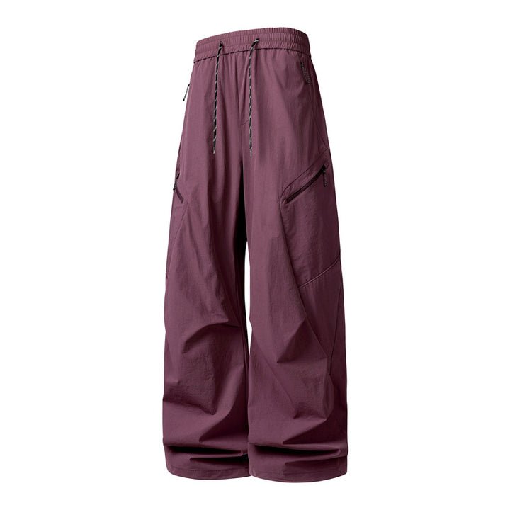 Herren Oversize-Utility-Cargo-Hose aus leichtem Nylon mit elastischem Kordbund, seitlichen Reißverschlusstaschen & weiter Ballon-Silhouette Drune