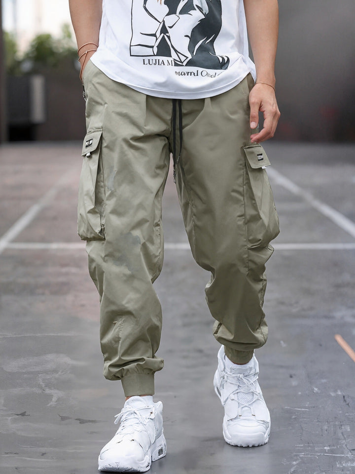 Herren Tapered Cargo-Joggerhose mit elastischem Tunnelzug, verstärkten Klappentaschen & gerippten Knöchelbündchen Drune