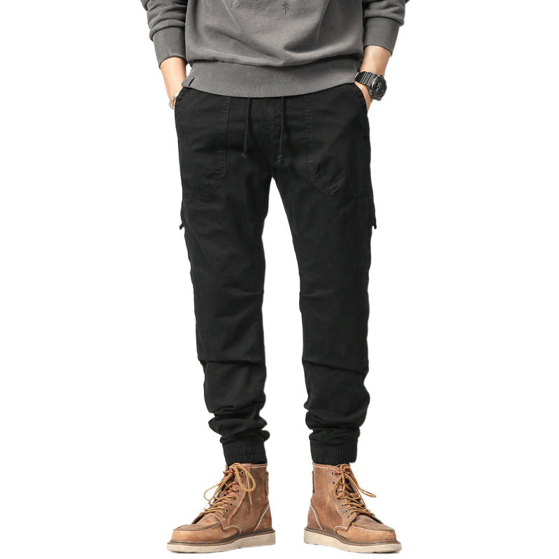 Herren Field-Joggerhose im Military-Workwear-Look mit Ziernähten, aufgesetzten Utility-Taschen und Kordelbund Drune
