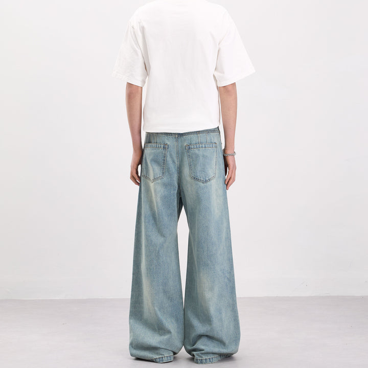 Herren Weit geschnittene Denim-Palazzohose mit geschwungenen Nahtpaneelen und extralangem Saum Drune