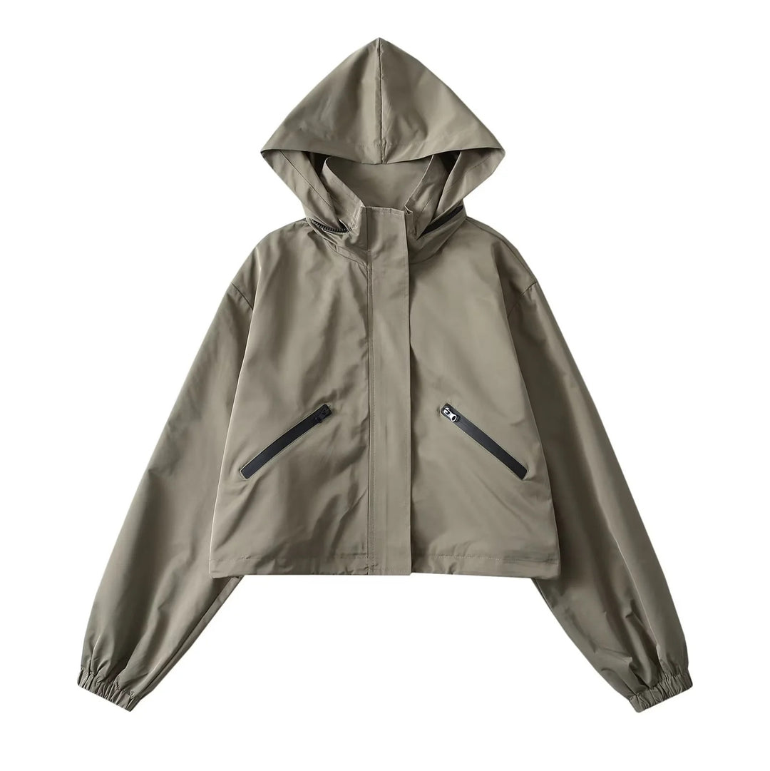Damen Cropped Regenjacke mit Kapuze, wasserabweisender Tech‑Qualität und schrägen Reißverschlusstaschen Drune