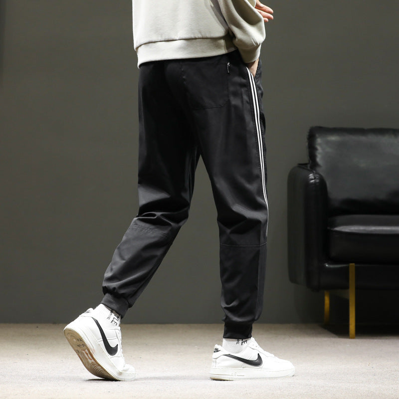 Herren Sportliche Nylon-Joggerhose mit elastischem Bund und seitlichen Kontraststreifen Drune
