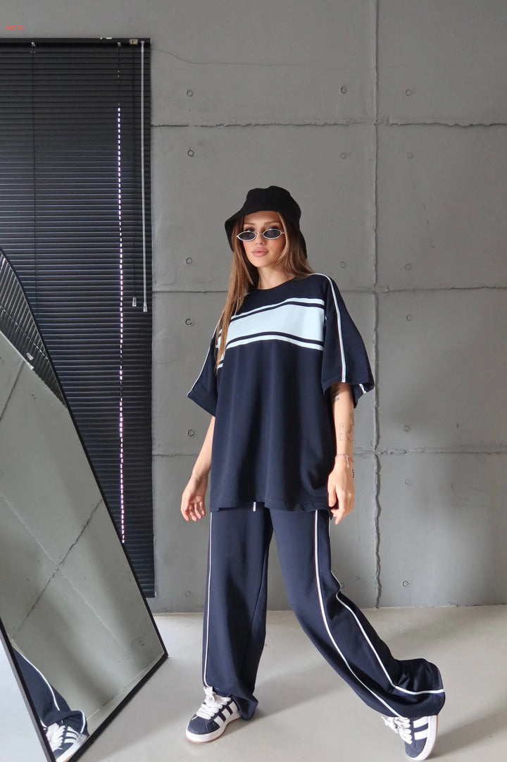 Damen stylisches Sportanzug-Set mit weitem Schnitt und kontrastierenden Streifen