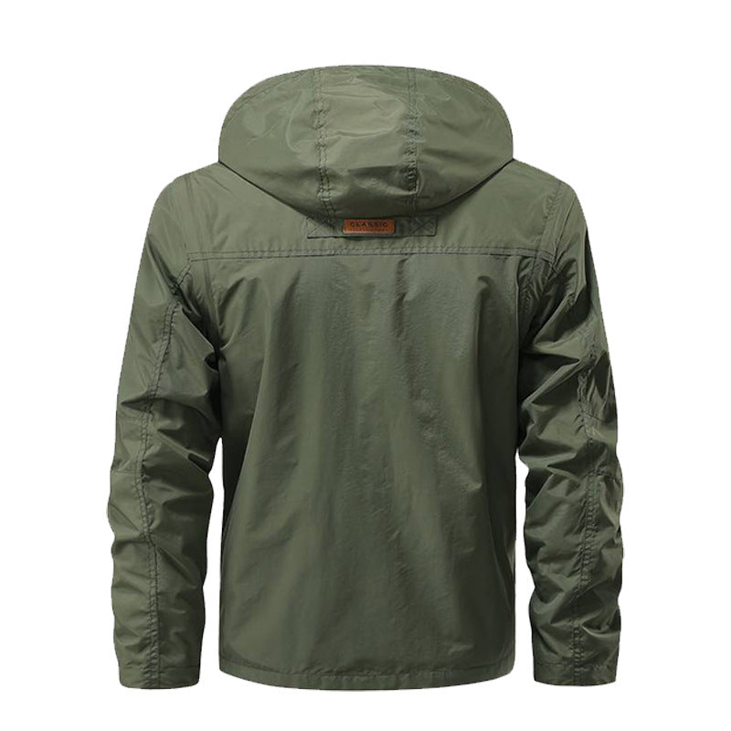 Herren nan multifunktionale Fieldjacke mit Kapuze, zahlreichen Klapp- und Reißverschlusstaschen sowie wind- und wasserabweisender Membran Drune