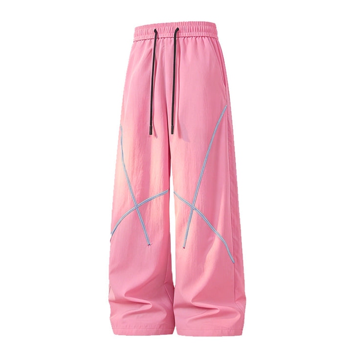 Herren Weite Funktions-Nylonhose mit Kordelbund, reflektierenden Nahtdetails & lässiger Baggy‑Silhouette Drune