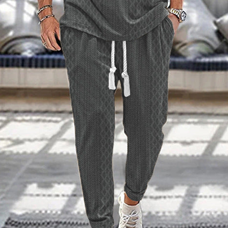 Herren Slim-Tapered Joggerhose im Struktur-Design mit Kordelzug und Eingrifftaschen Drune