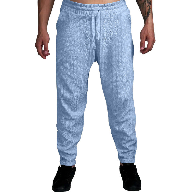 Herren Texturierte tapered Jogginghose mit Elastikbund, Tunnelzug & gerippten Knöchelbündchen Drune