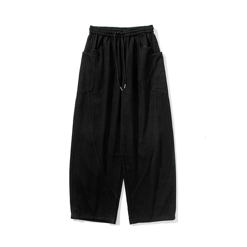 Herren Weite Loungehose mit Tunnelzug, aufgesetzten Taschen und markanten Panelnähten Drune
