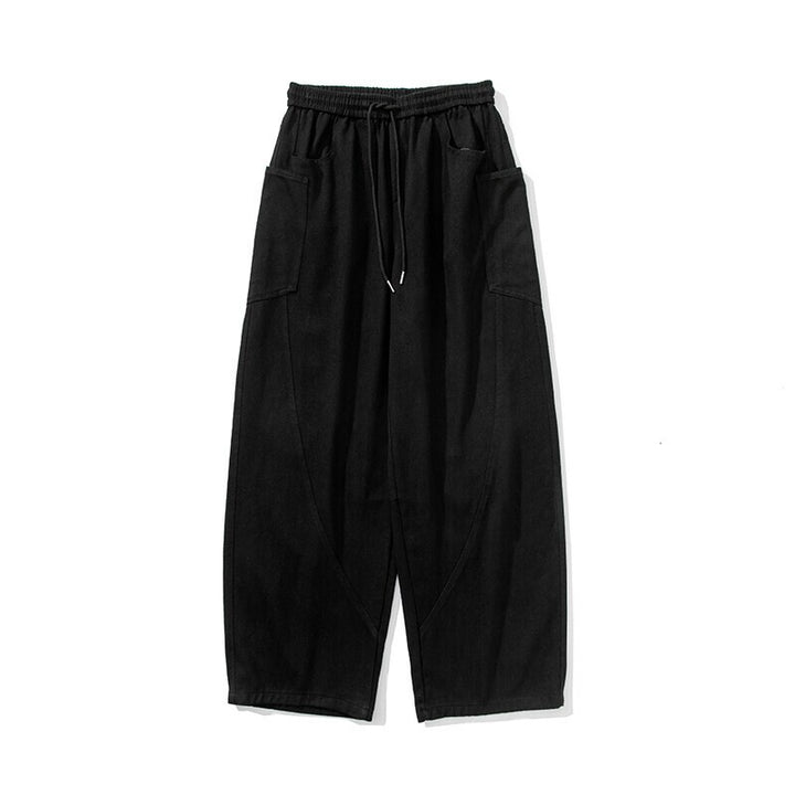 Herren Weite Loungehose mit Tunnelzug, aufgesetzten Taschen und markanten Panelnähten Drune