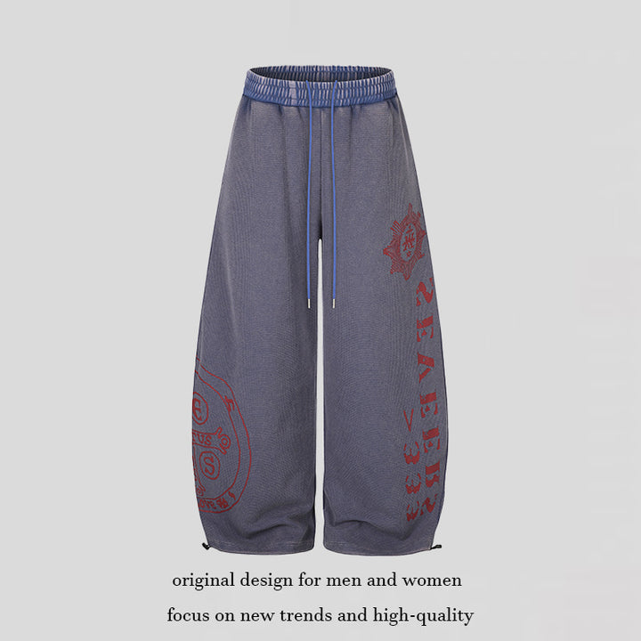 Damen Weite Mid‑Calf Palazzo‑Sweathose mit verstellbarem Saum, Tunnelzugbund und Statement‑Print Drune