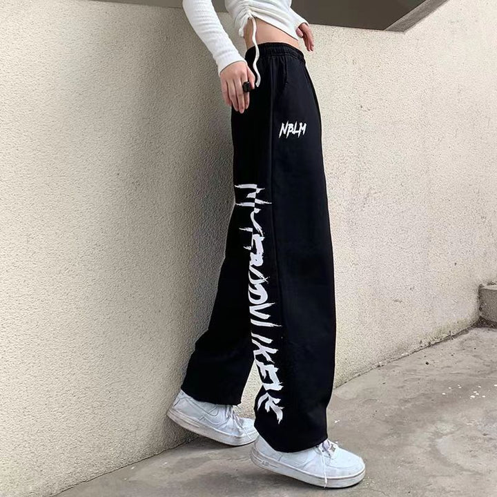 Damen nan locker geschnittene Wide‑Leg Jogginghose mit hohem Bund und markantem Seitenschriftzug Drune