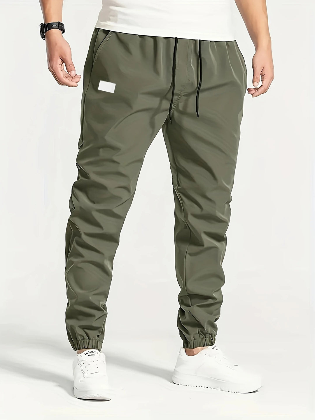Herren Slim‑Tapered Tech‑Joggerhose mit Tunnelzugbund, elastischen Knöchelbündchen und funktionalen Seitentaschen Drune
