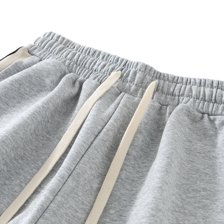 Herren Locker geschnittene Jogginghose mit elastischem Bund, Kordelzug und kontrastfarbenen Seitenstreifen Drune