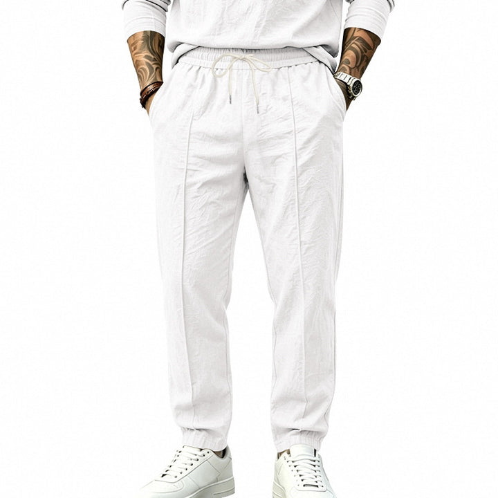 Herren Leichte Tapered-Jogginghose mit Bundfalten, elastischem Tunnelzug und Seitentaschen Drune