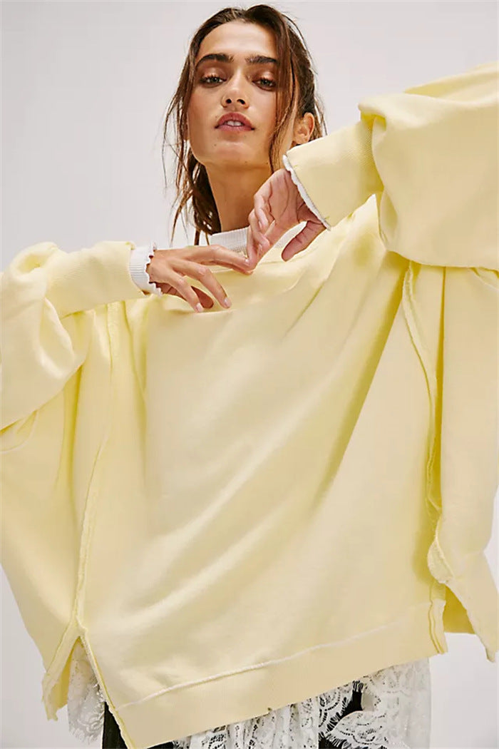 Damen oversized Sweatshirt mit Ballonärmeln, offenen Saumnähten und seitlichen Schlitzen Drune