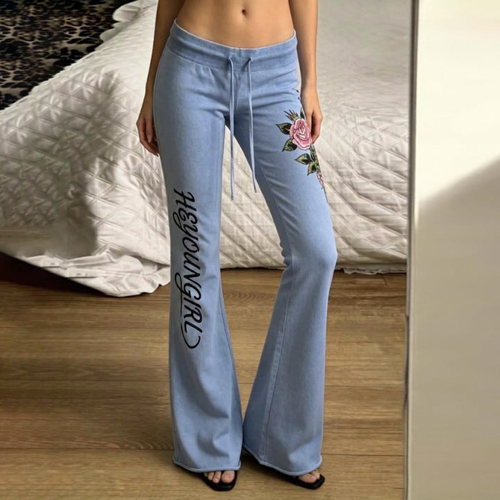 Damen nan ausgestellte Jersey-Sweathose mit Kordelzug, floralem Seitenprint und Statement-Schriftzug Drune