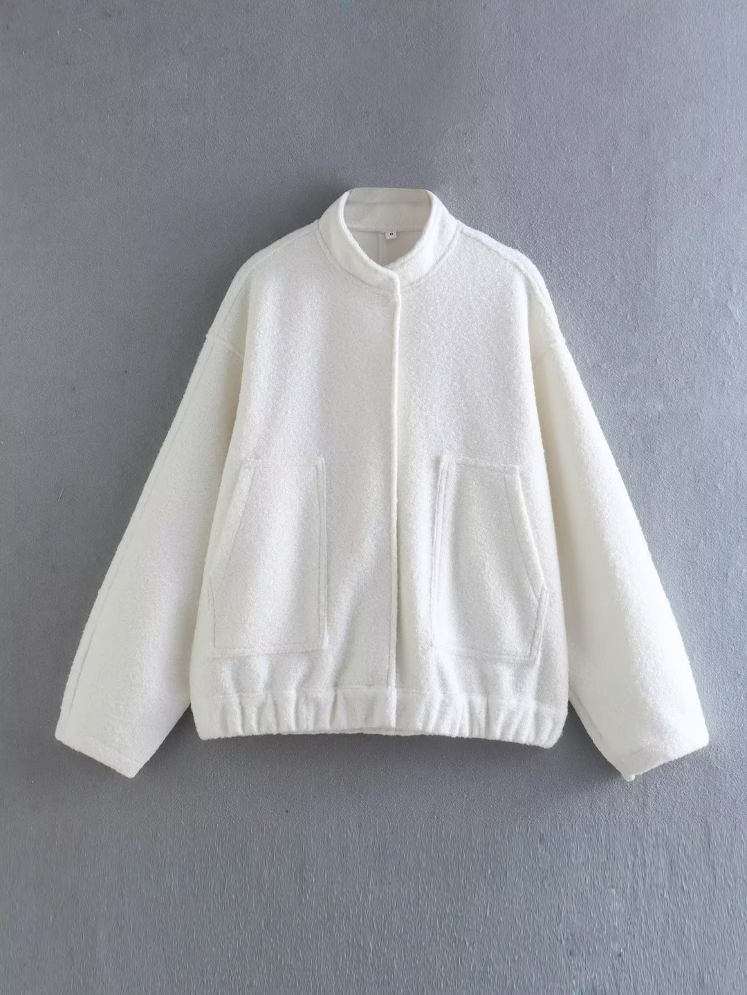Damen Oversized Strickjacke aus weichem Teddystoff mit Stehkragen und seitlichen Taschen Drune