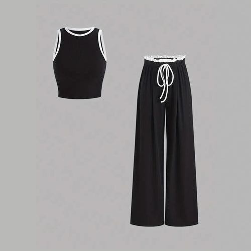 Damen stylishes Sport-Set mit hoch taillierter Weitbein-Hose und sportlichem Bustier Drune