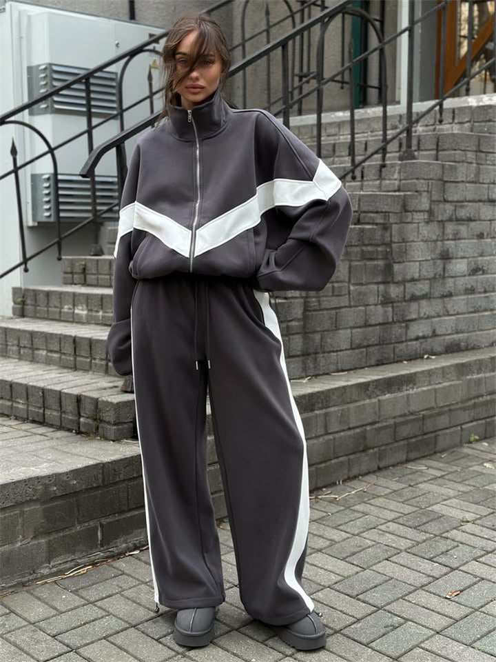 Damen eleganter sportlicher Zweiteiler Trainingsanzug mit Reißverschluss und kontrastierender V-Passe Drune