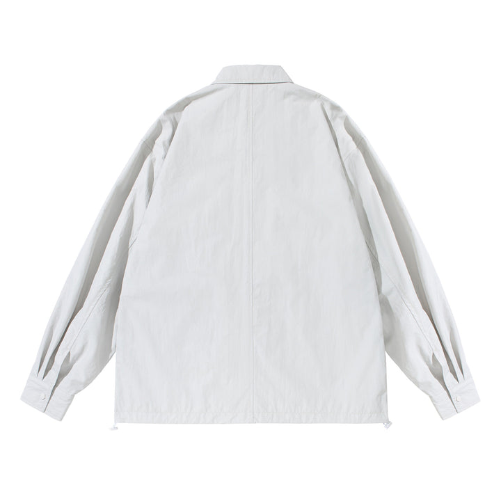 Unisex Oversize-Hemdjacke mit Druckknopfleiste und Pattentaschen Drune