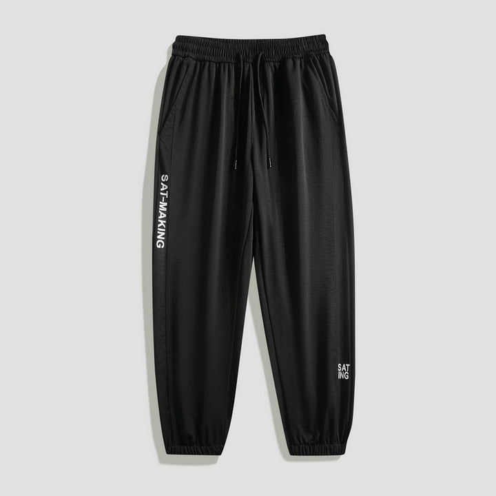 Herren Sportliche Jogginghose mit elastischem Bund und Reißverschlusstaschen Drune