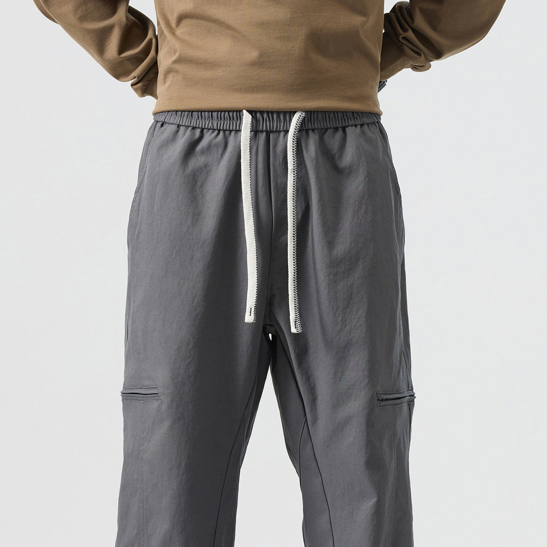 Herren Locker geschnittene Arbeitshose im Cargo‑Look mit Tunnelzugbund und flachen Knietaschen Drune