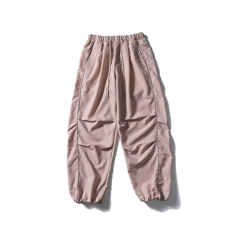 [Herren] weit geschnittene Nylon-Joggerhose im Utility-Stil mit Tunnelzugbund, Kontrastpaspel und elastischen Knöchelabschlüssen Drune
