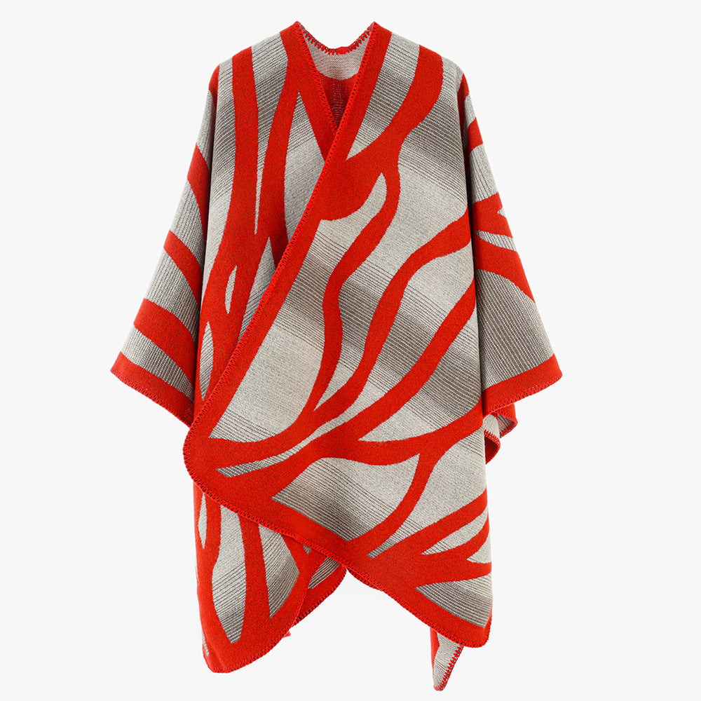 Damen Oversize-Strickcape mit abstrakter Wellenjacquard‑Struktur und kontrastierter Kettelkante Drune