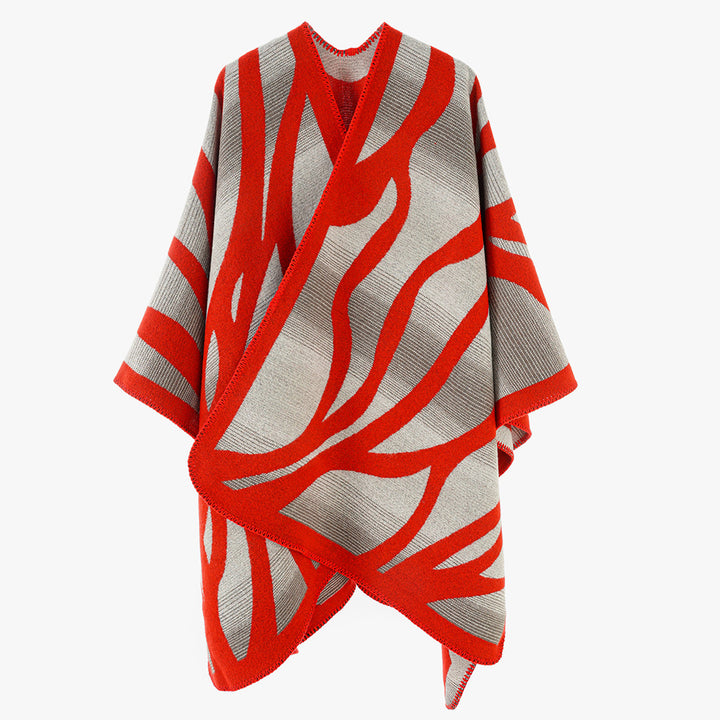Damen Oversize-Strickcape mit abstrakter Wellenjacquard‑Struktur und kontrastierter Kettelkante Drune