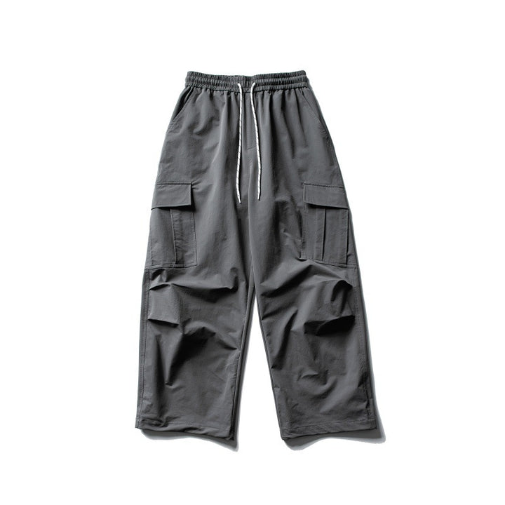 Unisex Weite Cargo-Utility-Hose im Baggy-Schnitt mit elastischem Kordelbund und großzügigen Klappentaschen Drune