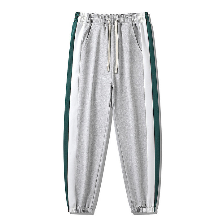 Herren Konische Trackhose mit Kordelzug, seitlichen Colorblock‑Streifen & elastischen Bündchen Drune