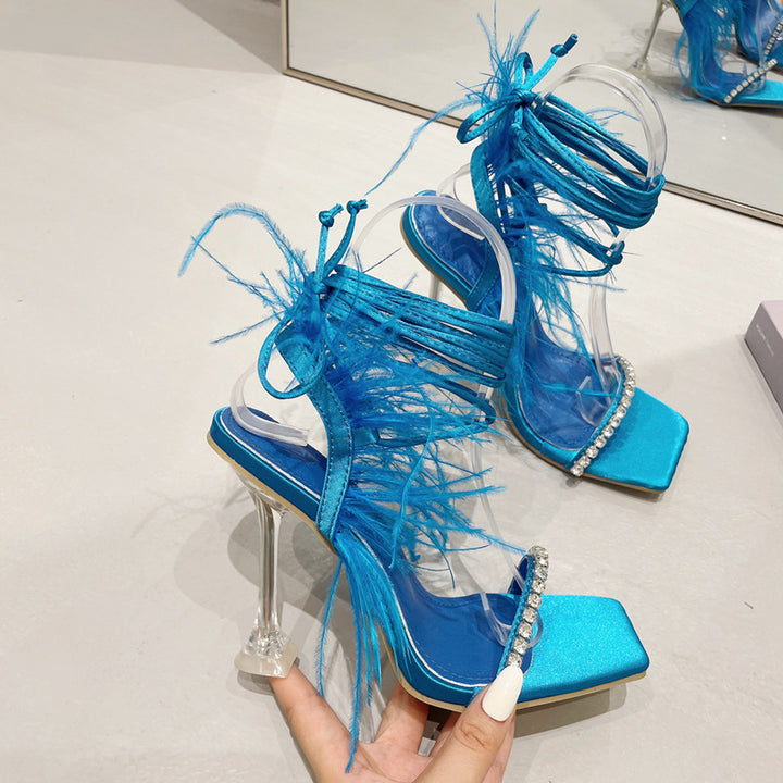 Damen Transparente High Heel Sandalen mit verzierenden Federn und funkelnden Strassdetail Drune