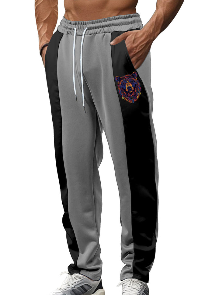 Herren nan sportive Trackpants mit seitlichen Kontrastbahnen elastischem Bund Kordelzug und Hirschstickerei Drune