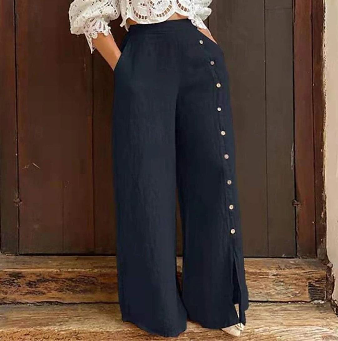 Damen weite Baumwollhose mit seitlichen Knopfdetails und eleganter Beinöffnung Drune